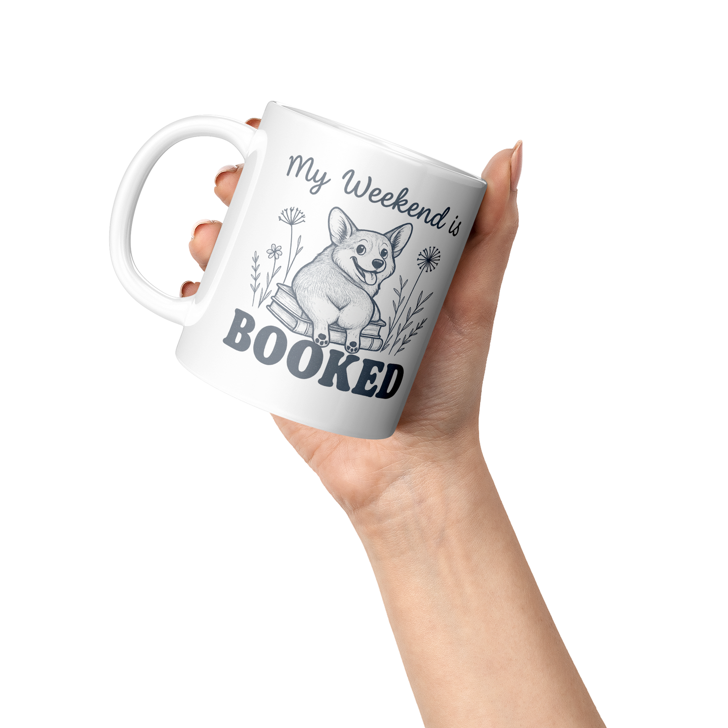Funny_Corgi_And_Book_Coffee_Mug_Lifestyle_Raised_Hand_LH_Mockup.png