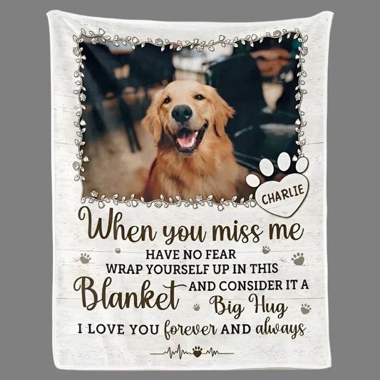 Blanket with a photo of a dog named Charlie and a sentimental message.