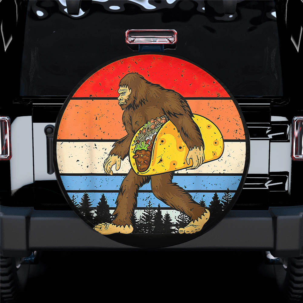 Bigfoot Holding A Taco Spare Tire Cover