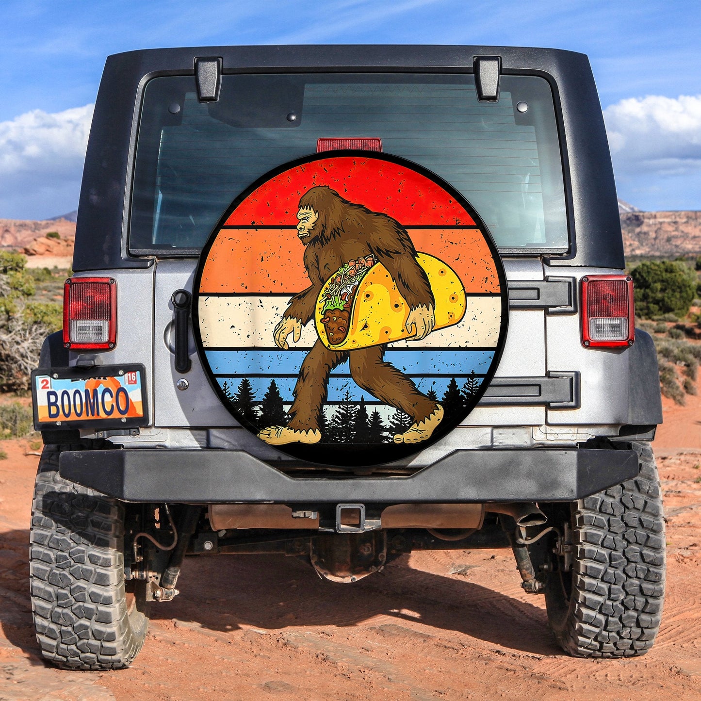 Bigfoot Holding A Taco Spare Tire Cover