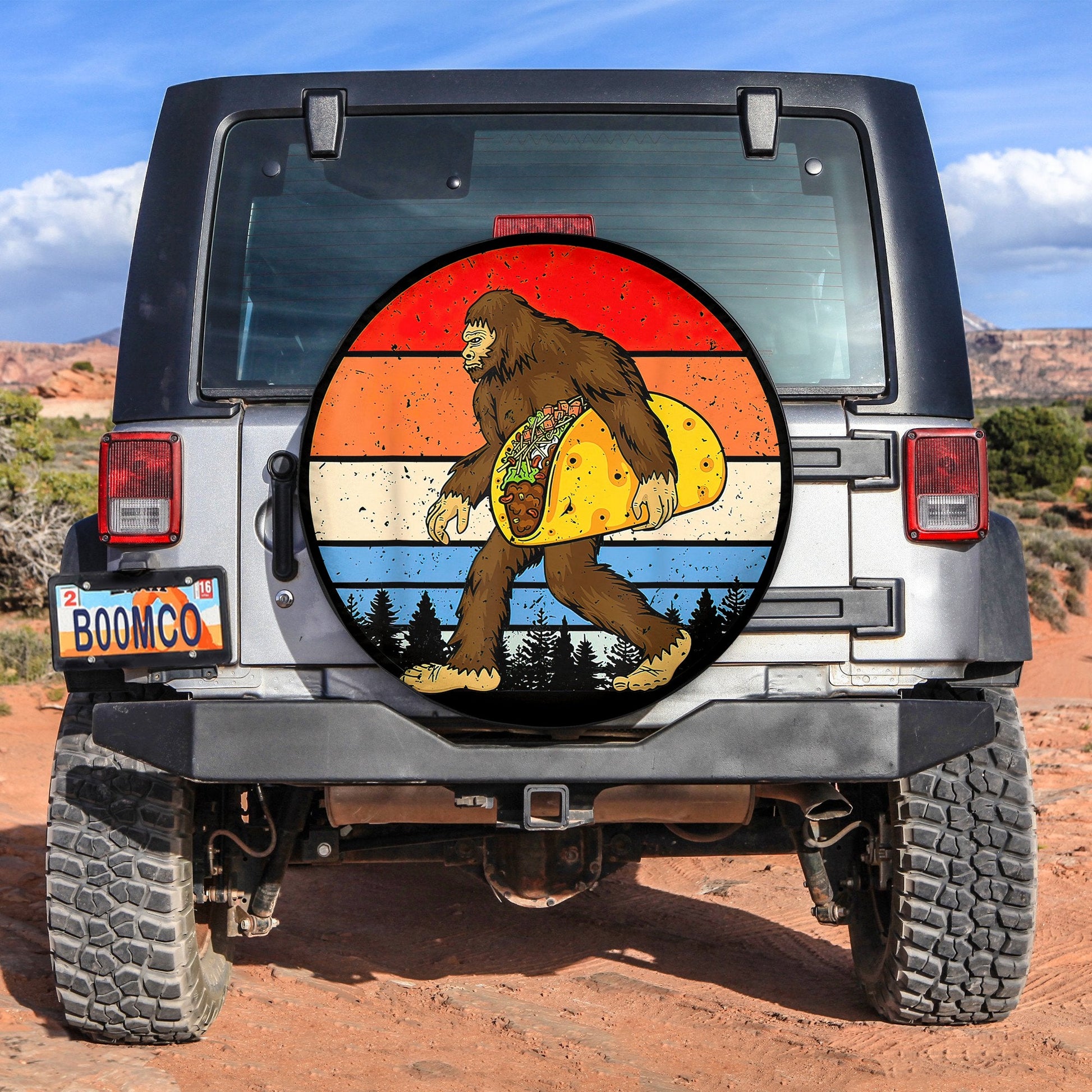 Bigfoot Holding A Taco Spare Tire Cover