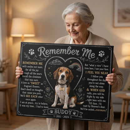 Older woman holding personalized Remember Me Buddy dog memorial canvas