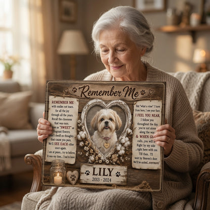 Customer holding rustic Remember Me dog memorial canvas